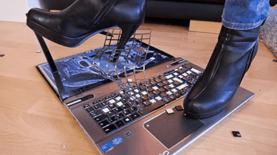 117427 - Crushing the slave's laptop under my ass and heels