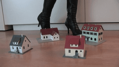 37293 - Model railway houses under sexy boots