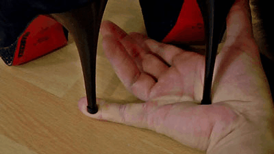 67816 - Painful hand and finger trampling with high heels