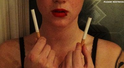 80250 - Mistress Teagan smokes 2 cigarettes at the same time