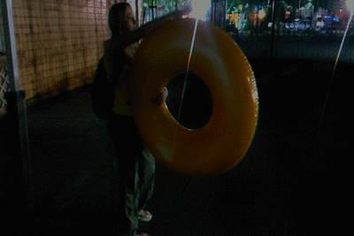 190340 - Alla blows off a big inflatable donut at night in the parking lot!!!
