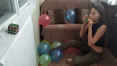 148222 - Girl blows up four balloons in a row