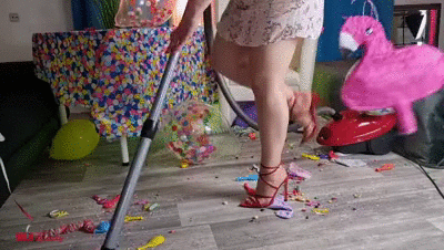 202214 - Mila - Vacuuming after piñata smashing