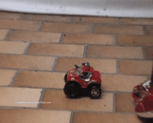 23435 - Little Car under red Pumps