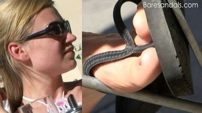 175478 - Blonde wiggling toes in black flip flops - Video update 13054 HD