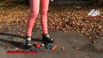Girl in platform sandals on toy cars 2 (0053)