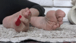 Wrinkled soles and toes wiggling in close-up